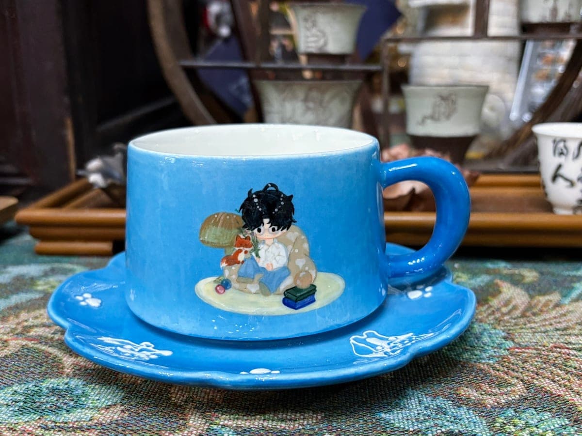 Blue Ceramic Cup & Saucer — Hand-Painted Portrait