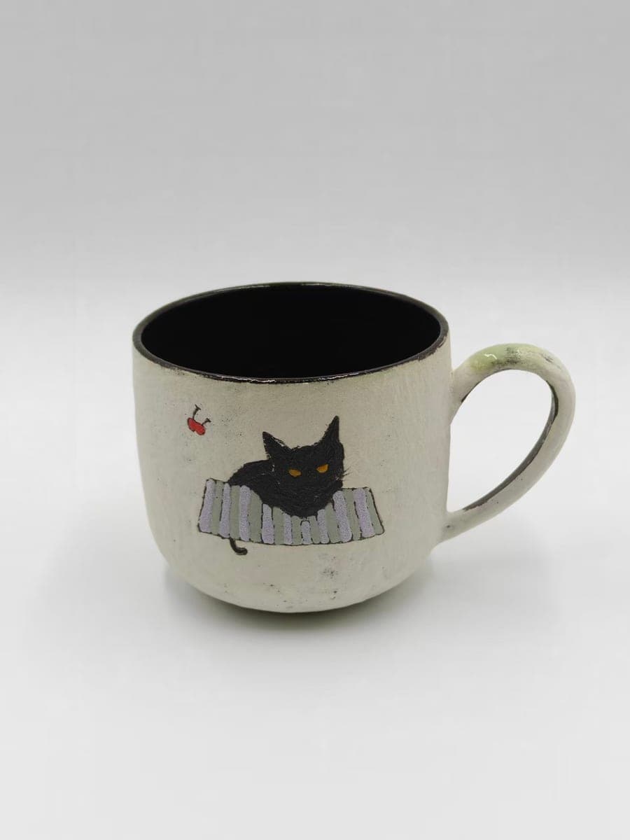 Handcrafted Ceramic Mug — Black Cat on Stripes