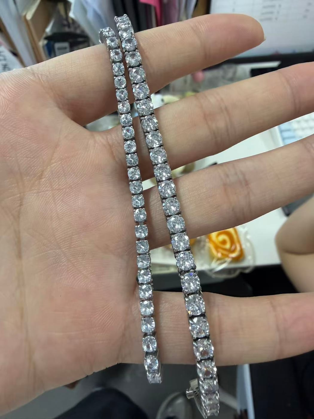 Cubic zirconia tennis bracelet — steel tone, about 4mm.